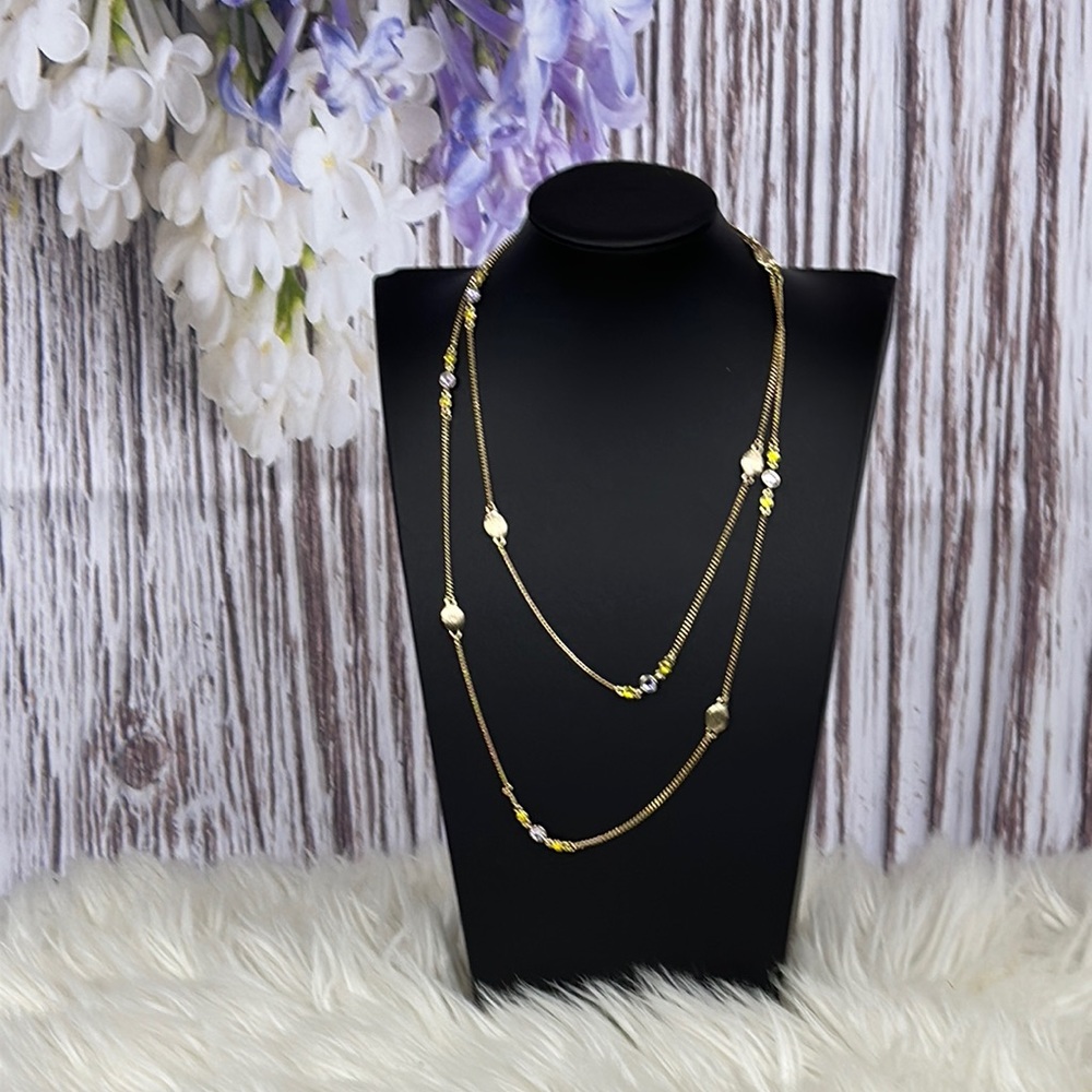 Yellow and purple gold necklace.